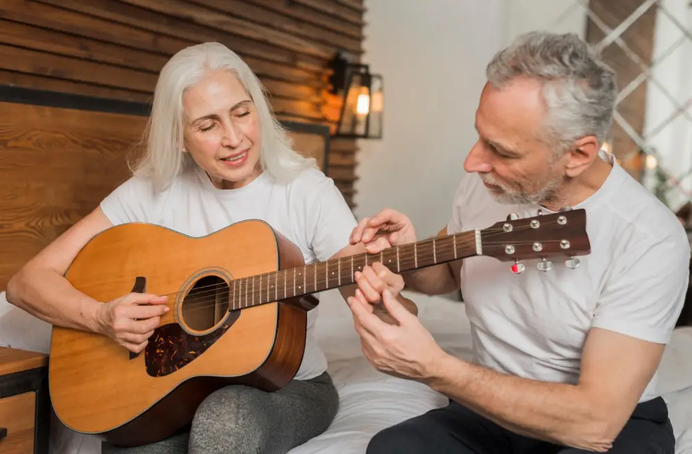 cours de guitare la musique participe au bien-être des personnes
